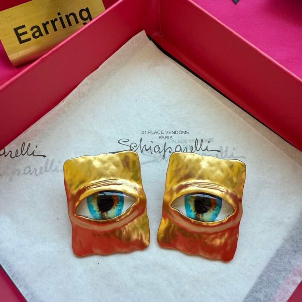 Schiaparelli Gold and Blue Eye Earrings